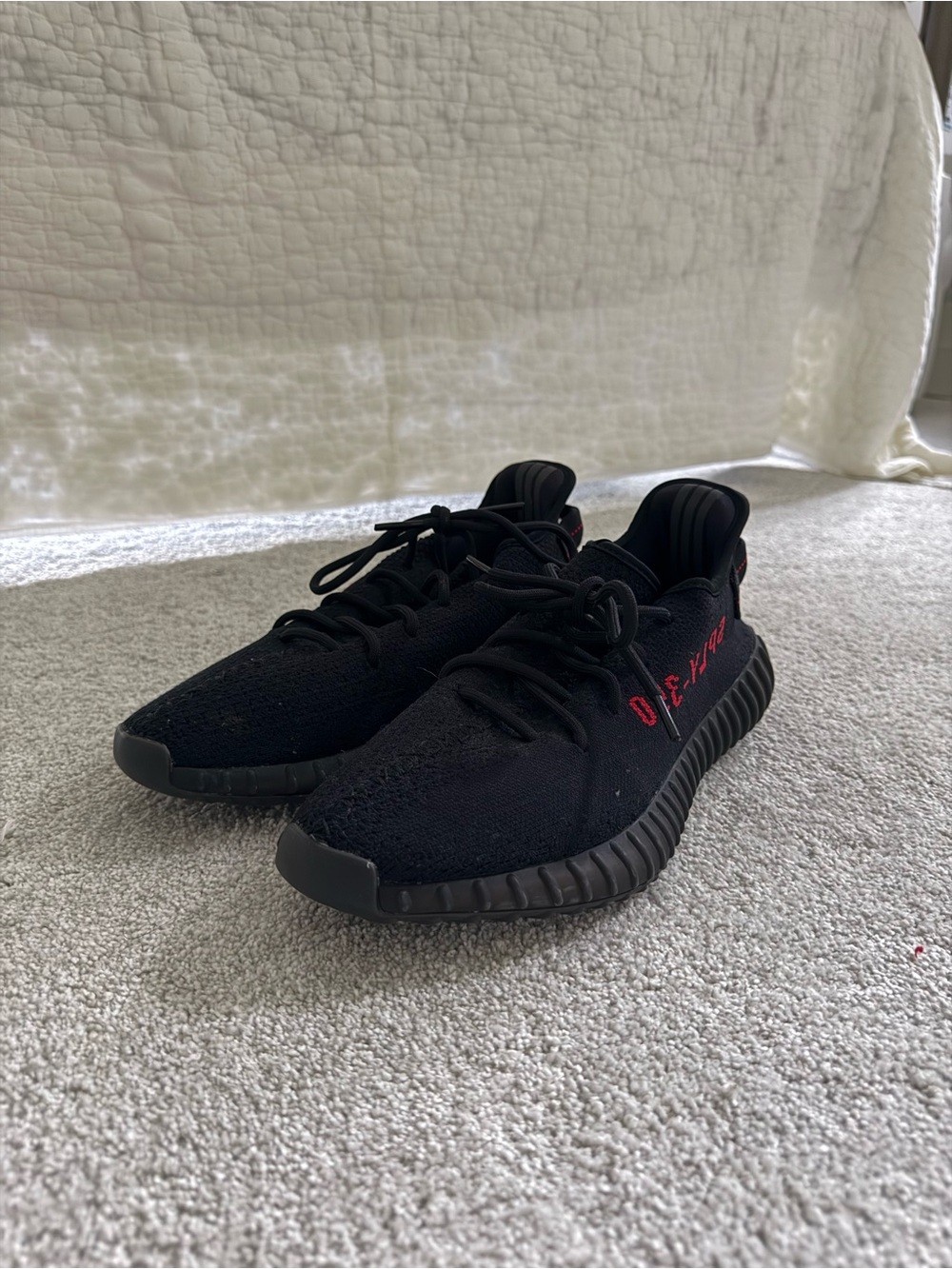 Yeezy Black Knit Sneakers with Red Side Accent